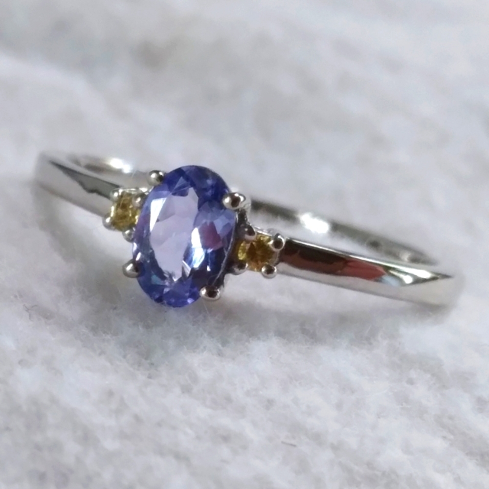Tanzanite solitaire with yellow sapphire accent sterling silver ring